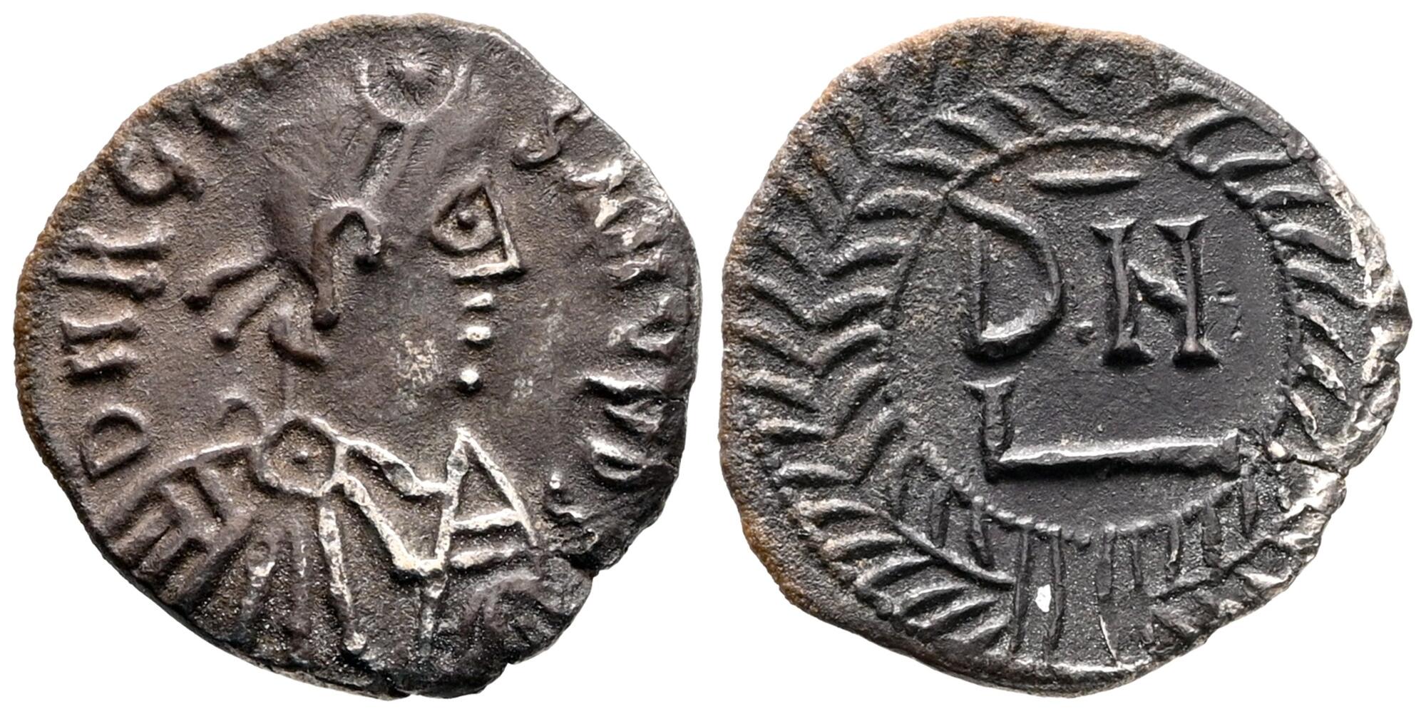 Antiche monete in bronzo usate come corredo funerario